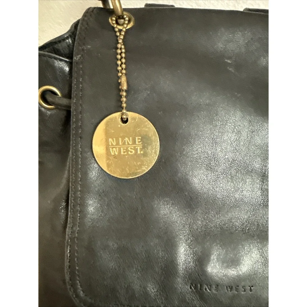Vintage Soft‎ Black Leather Ninewest Backpack Drawstring Flap Closure Brass Tag